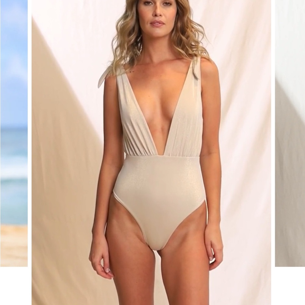 Maaji One piece swim suit New without tags. Size medium.